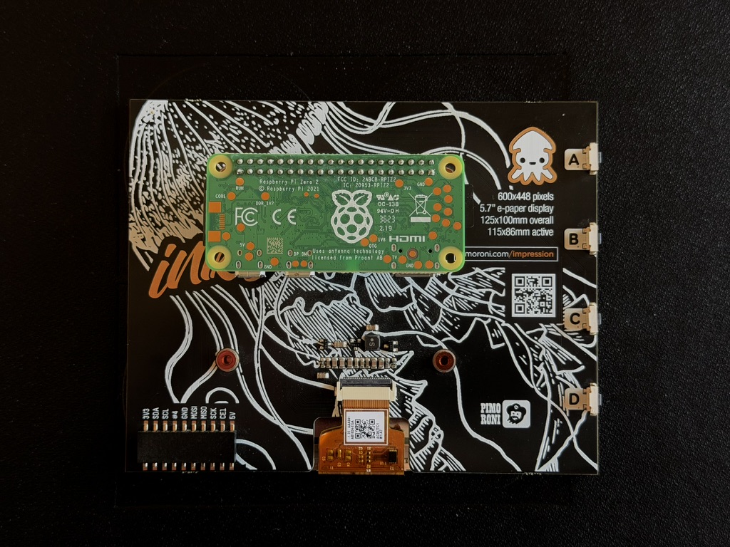The back of the panel, with a Raspberry Pi Zero 2 W pushed onto the pin header